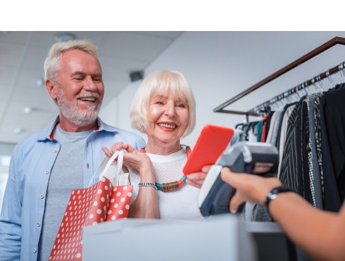 Hand holding a phone that says Mobile Wallet